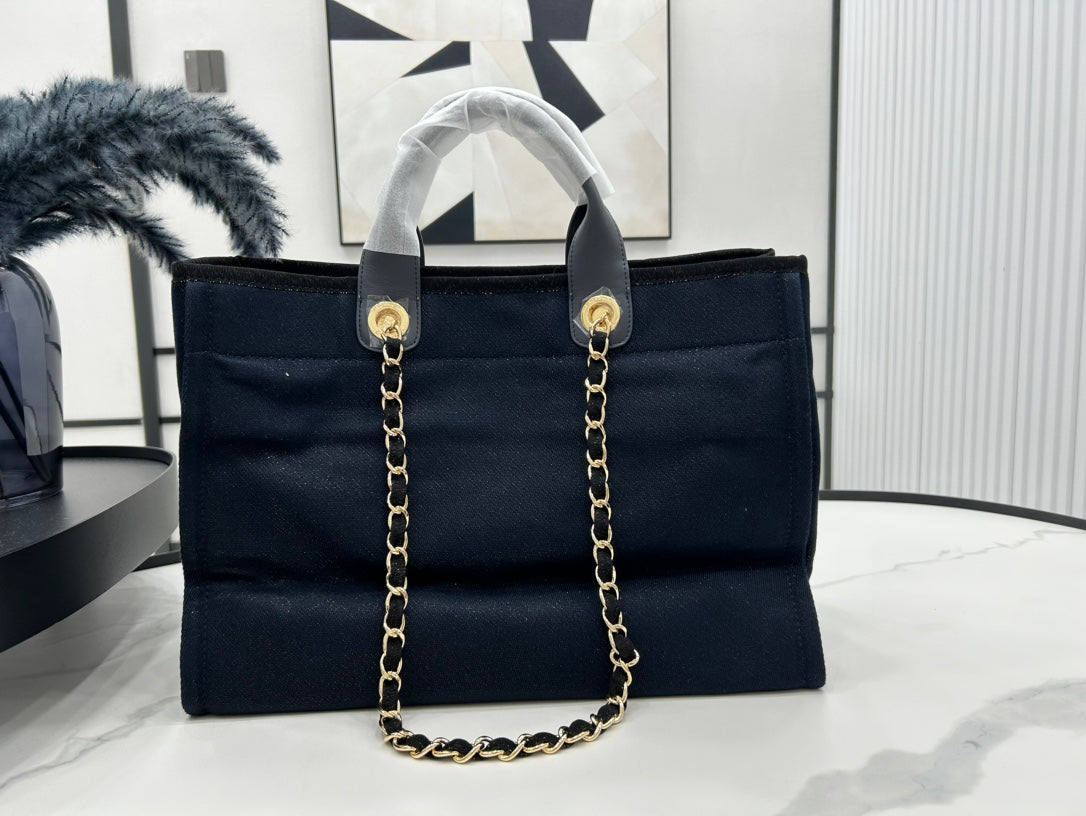 CHANEL DEAUVILLE LARGE 38 TOTE BAG IN BLACK CANVAS WITH GOLD EMBROIDERED LOGO